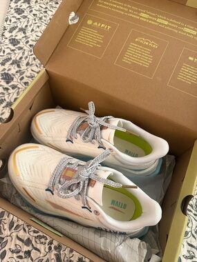 ALO Yoga Kids White Sneakers with Blue and Yellow Accents